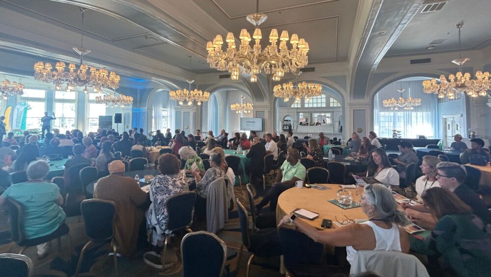 A full ballroom at Neighborhood Economics conference